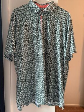 Men's Puma Short Sleeve Polo in Mint Floral Print with Coral Trim